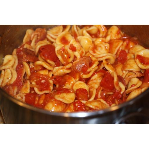 orecchiette with bacon and tomato sauce in pot.jpg